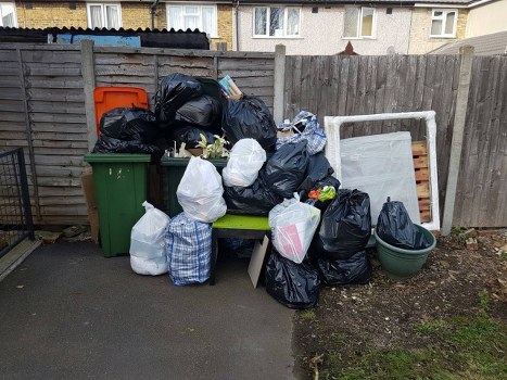 Workers sorting items for reuse during a Greenwich house clearance