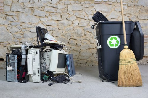 Technicians performing garden clearance services in Greenwich